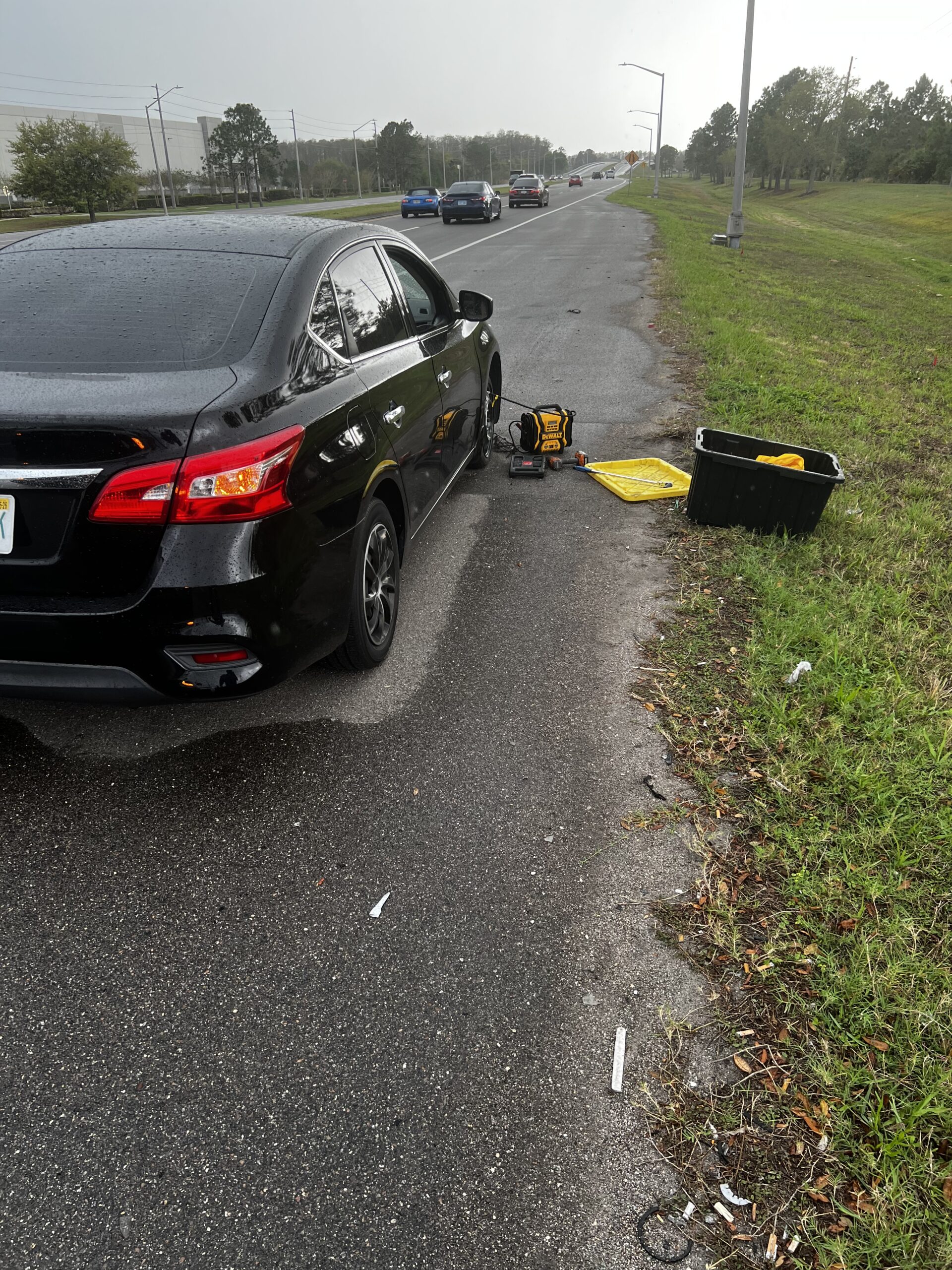 Always Easy Roadside Assistance helping a driver beside the road
